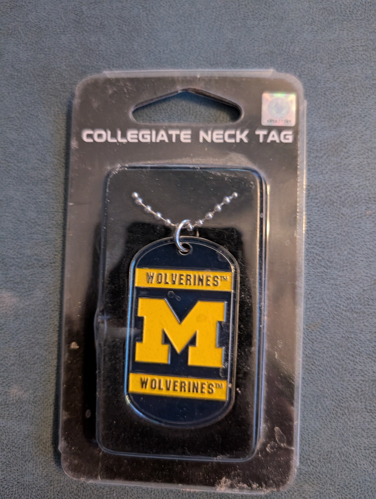 Neck chain with blick M tag